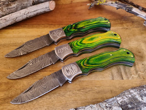 Engraved Damascus Pocket Knife with Leather Sheath and Green Wood Handle, Silver Bolster Engraved Damascus Folding Knife